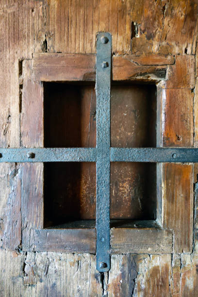 Rustic Wooden Window Frame with Iron Crossbars - Vintage Design for Architecture, Decor, or Historical Themes