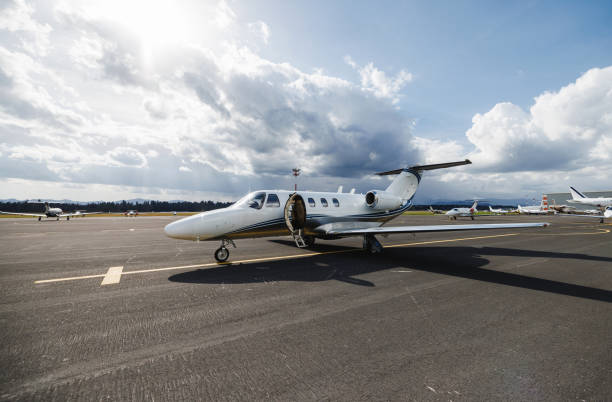 istock Luxury Small Private Jet Ready for Boarding on Airport Tarmac 2161728661