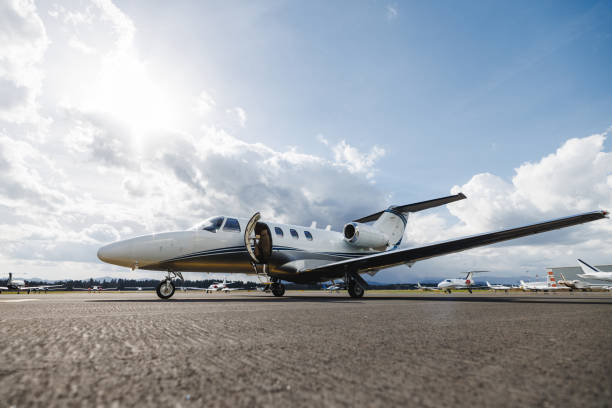 istock Luxury Private Jet on Tarmac Against Cloudy Sky 2161728666