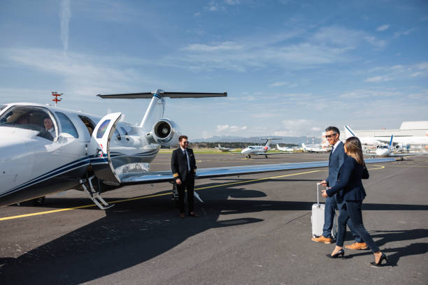 istock Business Executives Boarding Private Jet for Travel 2161728684