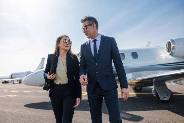 istock Business Professionals Exiting a Private Jet 2161728695