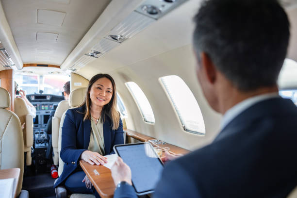 istock Asian Business Executives Working on Private Jet 2161728750