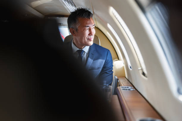 Successful Business Executive Contemplating in Private Jet