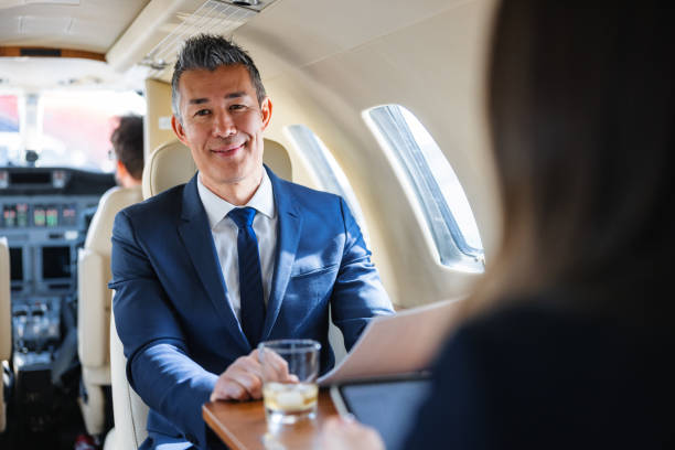istock Japanese Businessman in Private Jet 2161728759