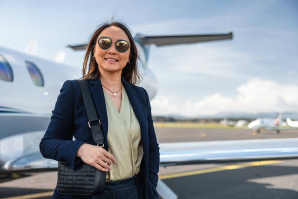 istock Confident Businesswoman at Private Jet Terminal 2161728762