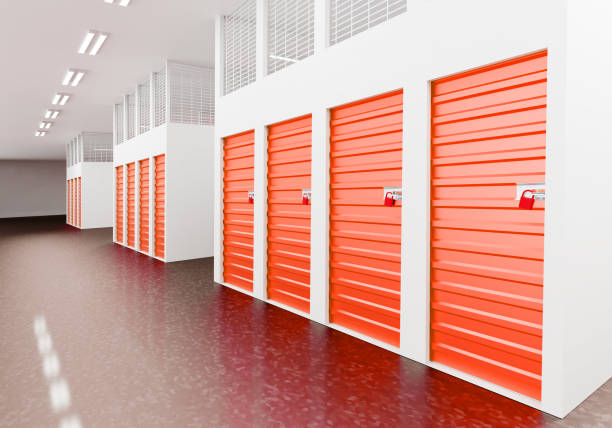istock Warehouse premises with red doors. Internal units. Corridor with storage units. Cells for self storage units. Leased storage space concept. Safekeeping cells for personal items. 3d illustration 2161730415