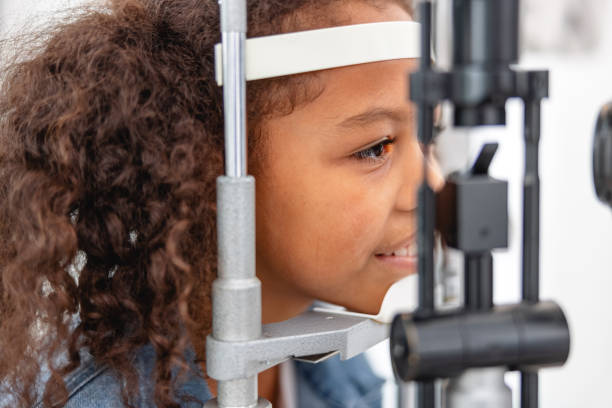 istock An Optometrist Checking Young Girl's Vision With Trial Frame 2161734038