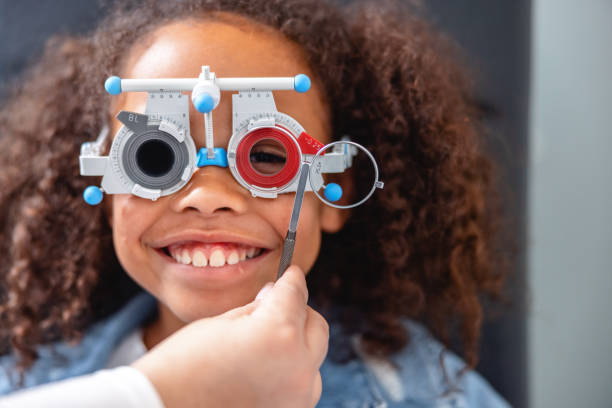 istock Young Girl Wearing Phoropter 2161734058