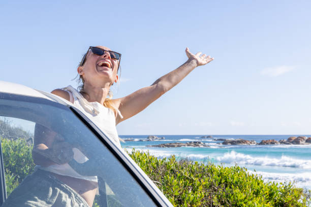 istock Joyful Woman Enjoying Beach View 2161736166