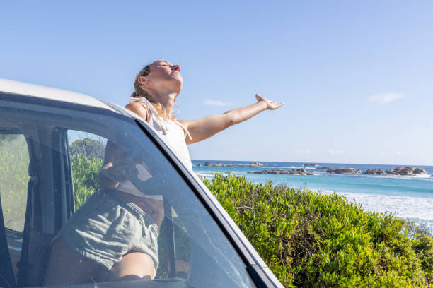 istock Joyful Woman Enjoying Beach View 2161736169