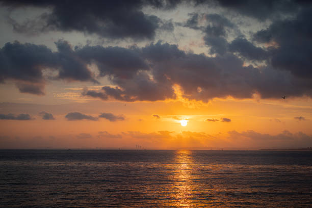 Sun is setting over by the sea.Istanbul - Turkey.