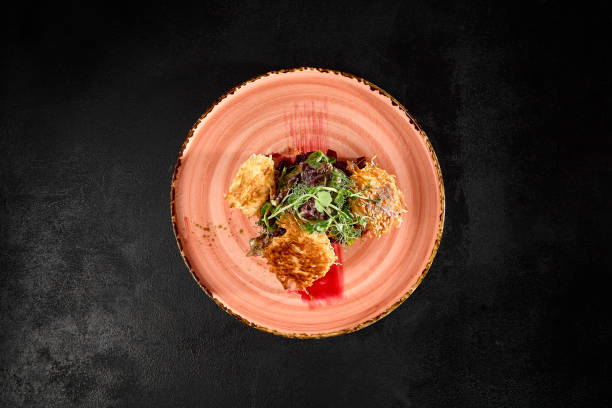 istock Crispy Tempura Fried Cheese with Beetroot and Fresh Greens on Elegant Plate 2161747645