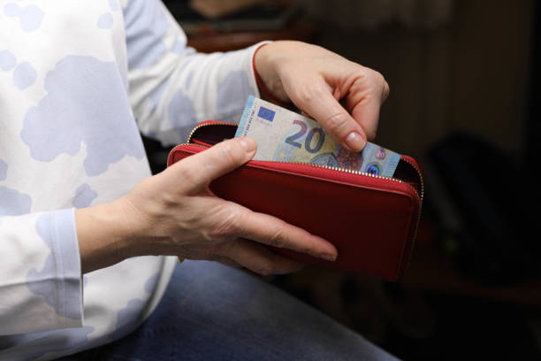 Twenty euro note in a female hand