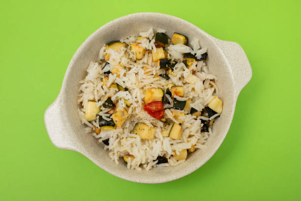 istock Boiled rice with vegetables in small bowl 2161752898
