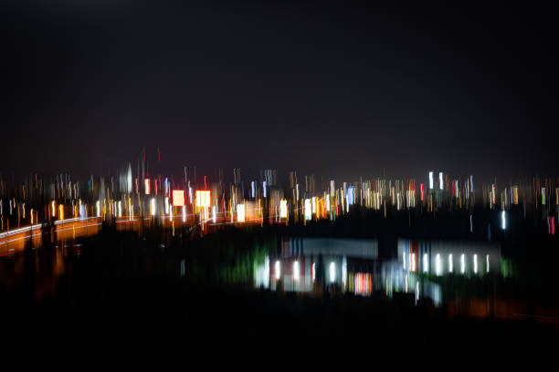Creative background of colorful motion blurred city lights