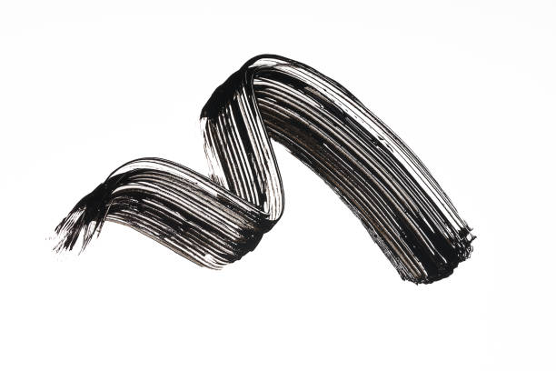 Black mascara brush strokes isolated on white