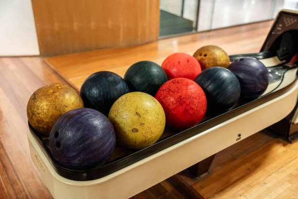 istock Bowling is a target sport and recreational activity in which a player rolls a ball toward pins 2161759946