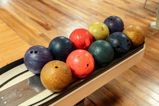 istock Bowling is a target sport and recreational activity in which a player rolls a ball toward pins 2161760409