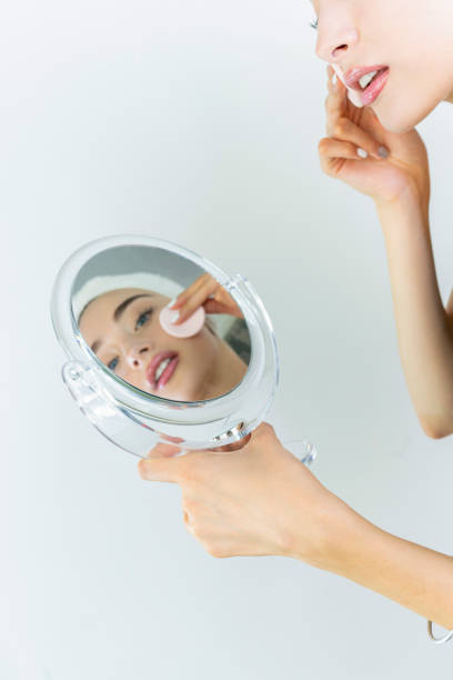 istock Young woman doing makeup. Skin care concept 2161763209