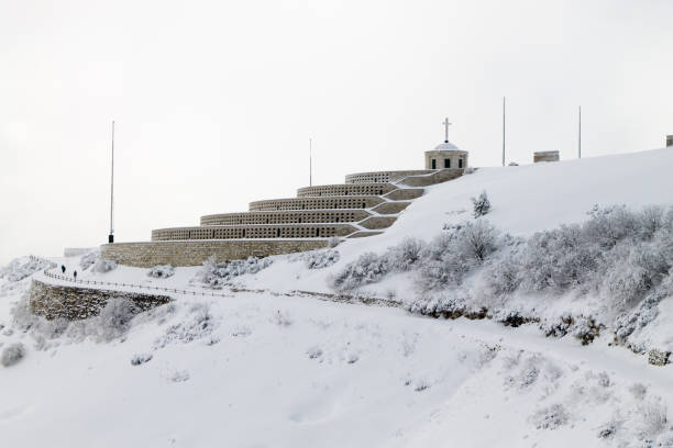 istock Mountain winter landscape. Mount Grappa war memorial building view 2161763339