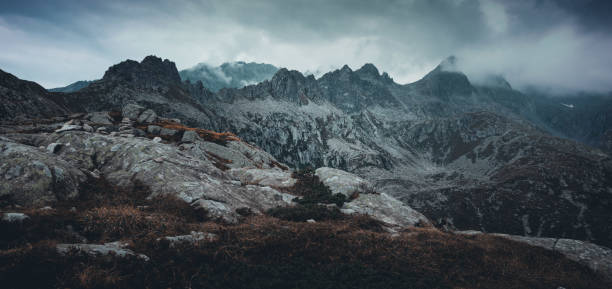 Moody mountain range on a cloudy day, Dolomites, Italy