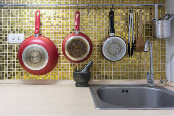 istock Modern kitchen utensils on a golden background. 2161766802