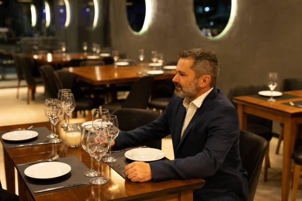 istock Elegant 50 year old man in a restaurant 2161767719