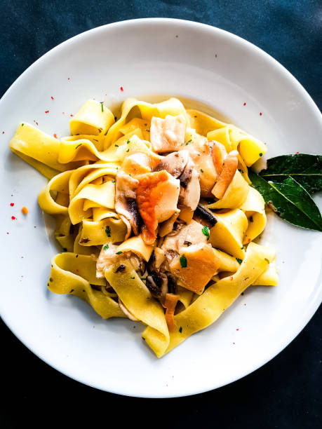 istock Pasta with Shrimps Dinner Dish on a the table 2161770977