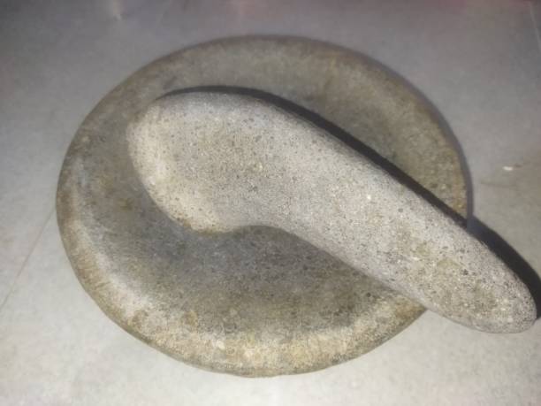 istock mortar and pestle made of stone. traditional cooking tools 2161771445