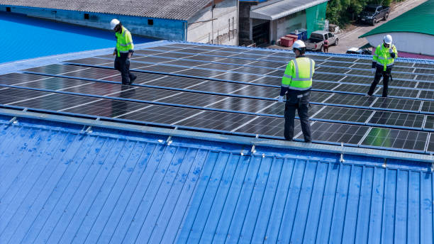 istock engineer man inspects construction of solar cell panel or photovoltaic cell by electronic device. Industrial Renewable energy of green power. factory worker working on tower roof. 2161773637
