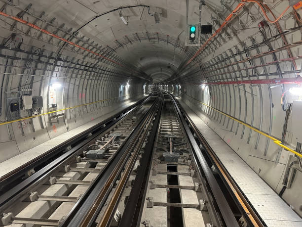 istock 4K. Time lapse automatic train subway tunnel fast speed. Metro subway with a tunnel and a train moving fast. Tube lines in the tunnel. 4K.Time lapse automatic train subway tunnel fast speed 2161775349