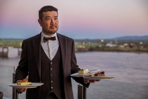 Server bringing desserts to restaurant patrons