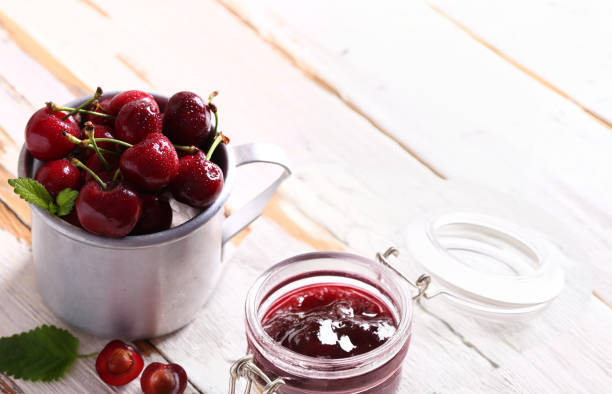 istock organic cherry jam and fresh berries 2161775597