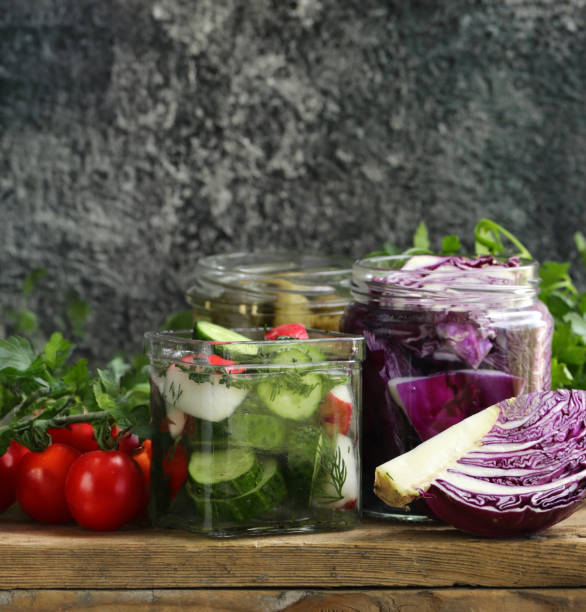 istock various homemade pickles, cucumbers, cabbage, olives 2161775696