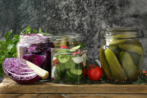 istock various homemade pickles, cucumbers, cabbage, olives 2161775723