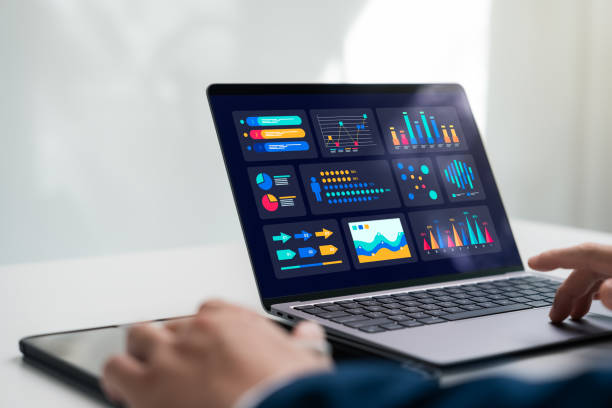 istock Businessman using laptop with charts dashboard analyzing business data marketing sales development. 2161777540