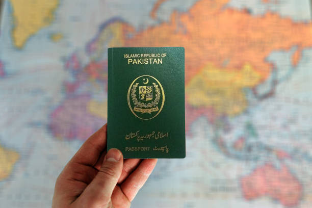 istock Pakistan passport in man hand 2161784542