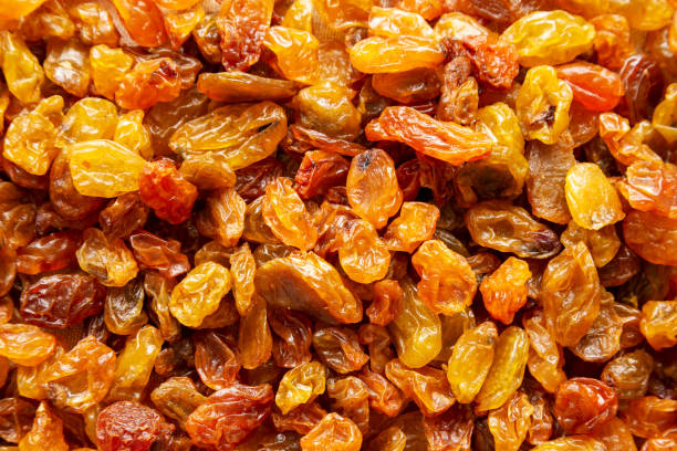 istock Organic Dried Raisins Background, top view. Flat lay, overhead. 2161785011