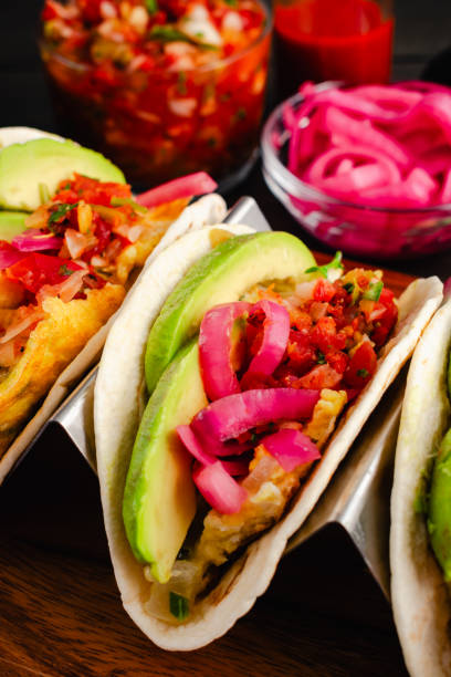 istock Tex-Mex Migas Breakfast Tacos in a Taco Holder Close-up 2161787652