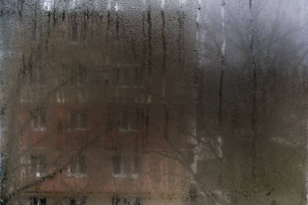 istock water on wet glass. drops texture background 2161789564