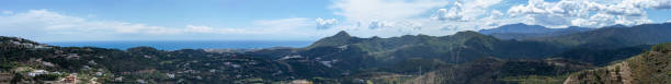 istock Clouds on blue sky over mountains and sea 2161790581