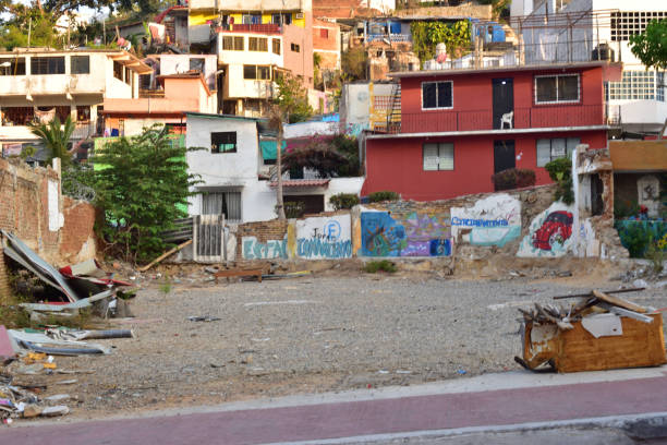 Vacant land on La Quebrada street in the center of Acapulco Acapulco, Mexico - April 27 2024: Vacant land on La Quebrada street in the center of Acapulco poverty mexico environment slum stock pictures, royalty-free photos & images