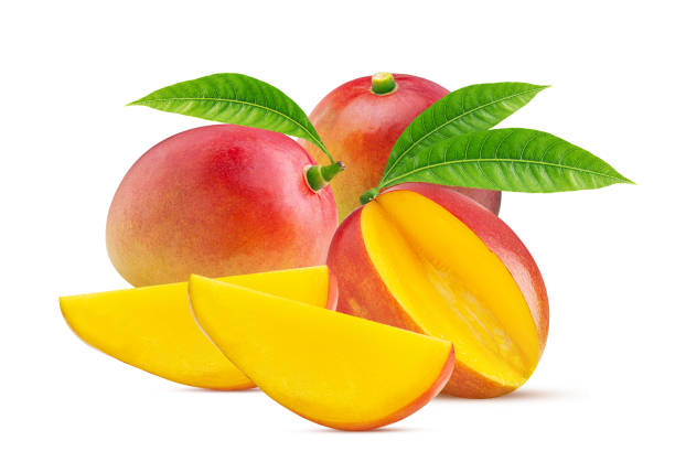 istock Two mango exotic friut one three quarters with green leaf and slice 2161797766