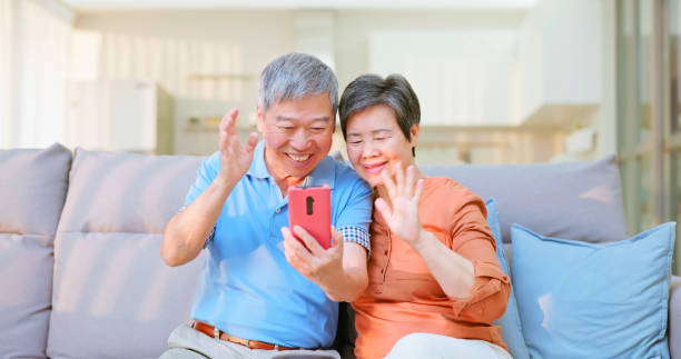 istock elderly couple mobile video call 2161799069