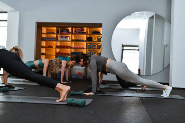 istock Plank Core Workout For Athletic Females In Gym 2161799197