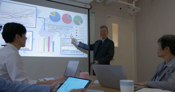 istock senior executive businessman do presentation 2161799254