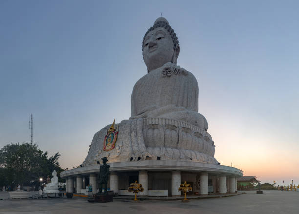 A picture of the large Phuket Big Buddha statue, at sunset.