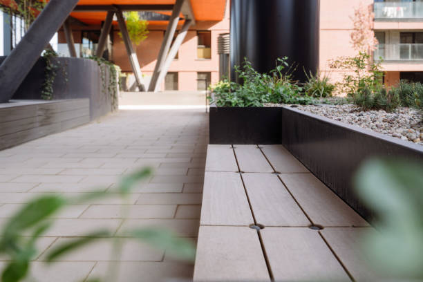 istock Modern patio with planters and wood bench 2161803739