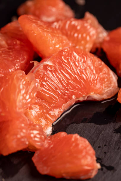istock slices of peeled grapefruit close-up 2161807809