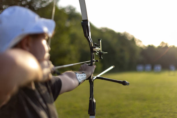 istock Teenage boy practicing archery with recurve bow on the training field 2161809797
